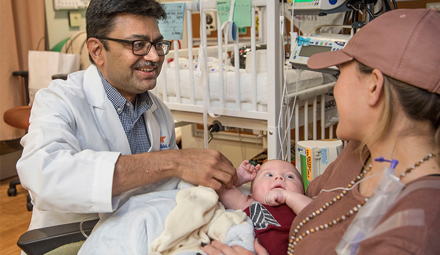 Dr. Ajay Talati with neonatology research patient at Le Bonheur Children's Hospital